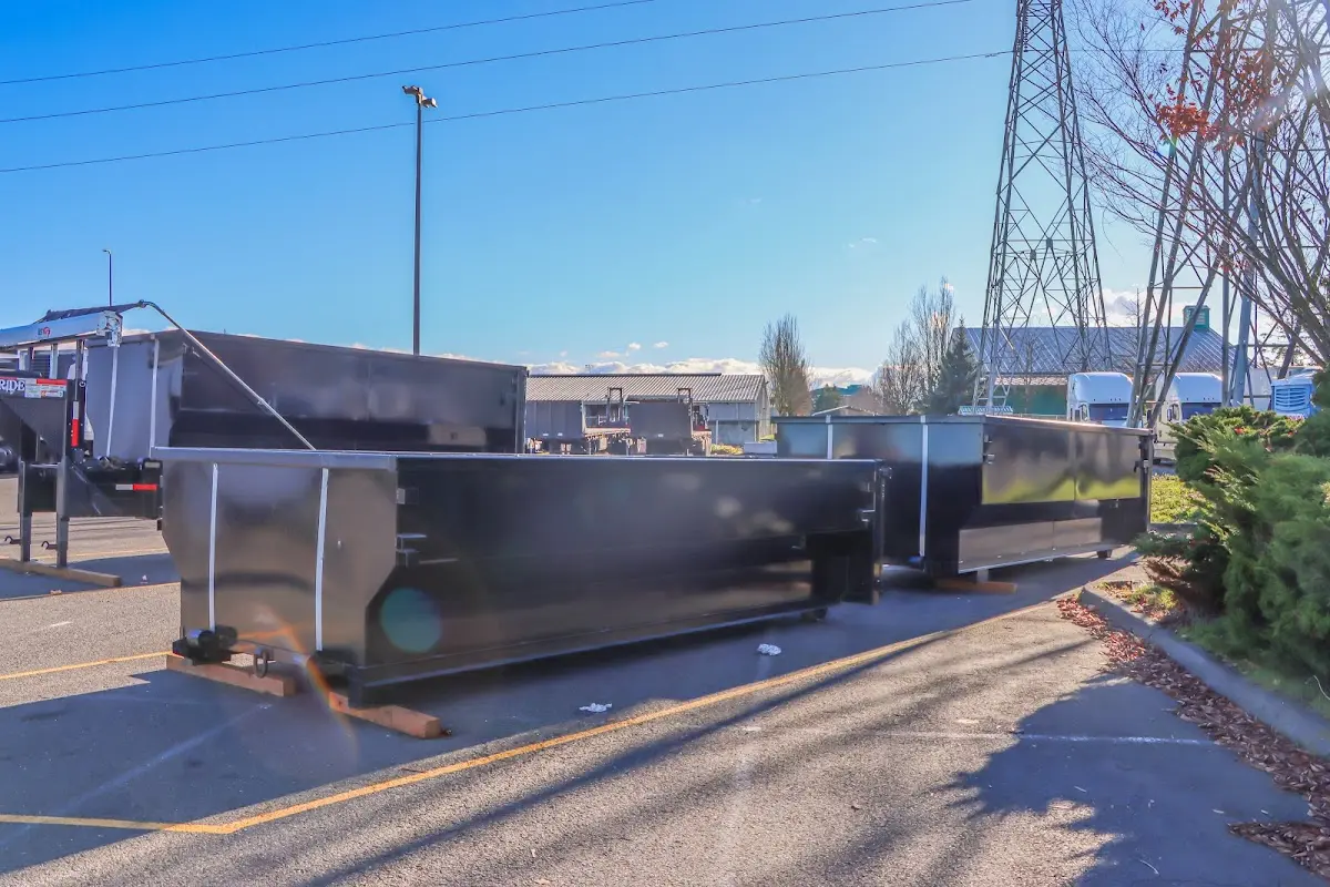 Roll-off dumpster ready for waste disposal at job site for Yard Waste Dumpster Rental in Suffolk